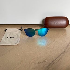 Illesteva mask sunglasses.